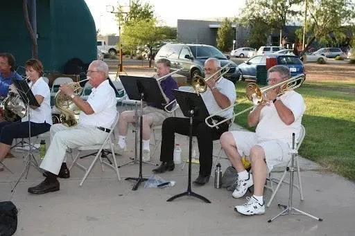 Sierra Vista Community Band brass section performing outdoors