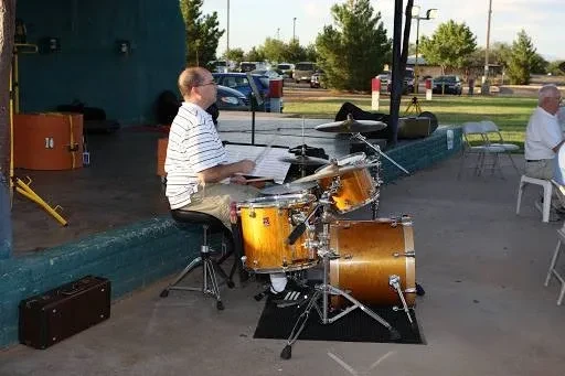 Drummer performing at an outdoor Sierra Vista Community Band concert