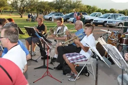 Trumpet players performing outdoors at Veterans Memorial Park