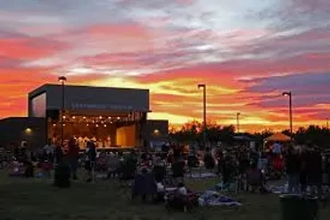 Outdoor concert at Veterans Memorial Park at sunset